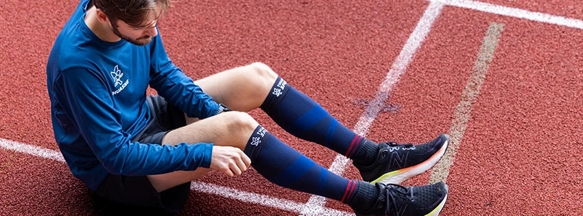 Coureur en récupération à la fin d'une séance sur piste