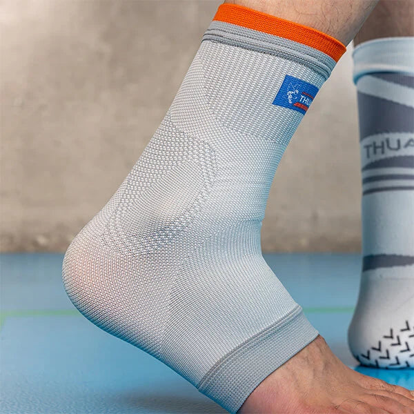 Chevillère de maintien compressive blanche vue de côté