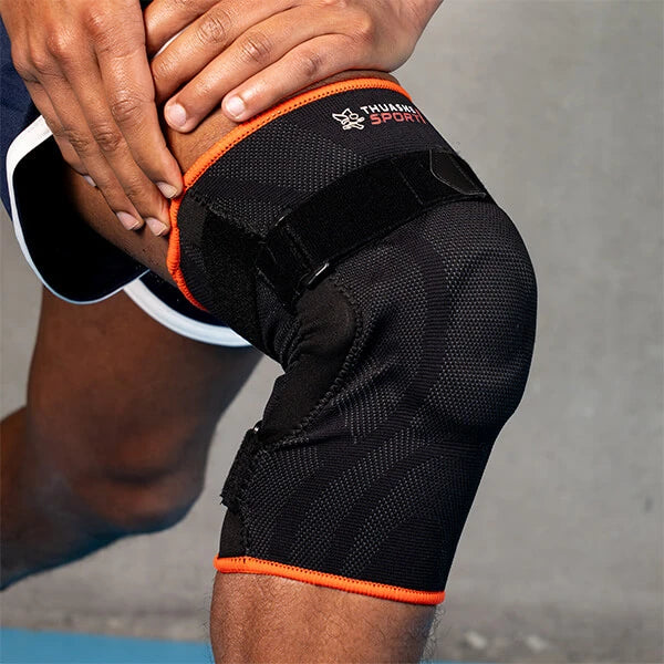 Genouillère ligamentaire pendant la pratique sportive