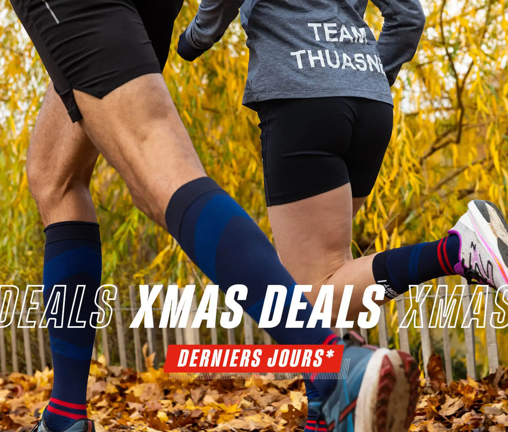 Couple de coureurs portant de la compression sport